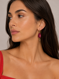 Red earrings pendant with golden four-leaf clover