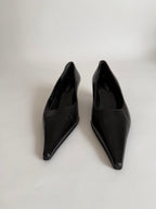Pointed toe pumps with heel