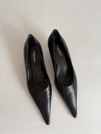 Pointed toe pumps with heel
