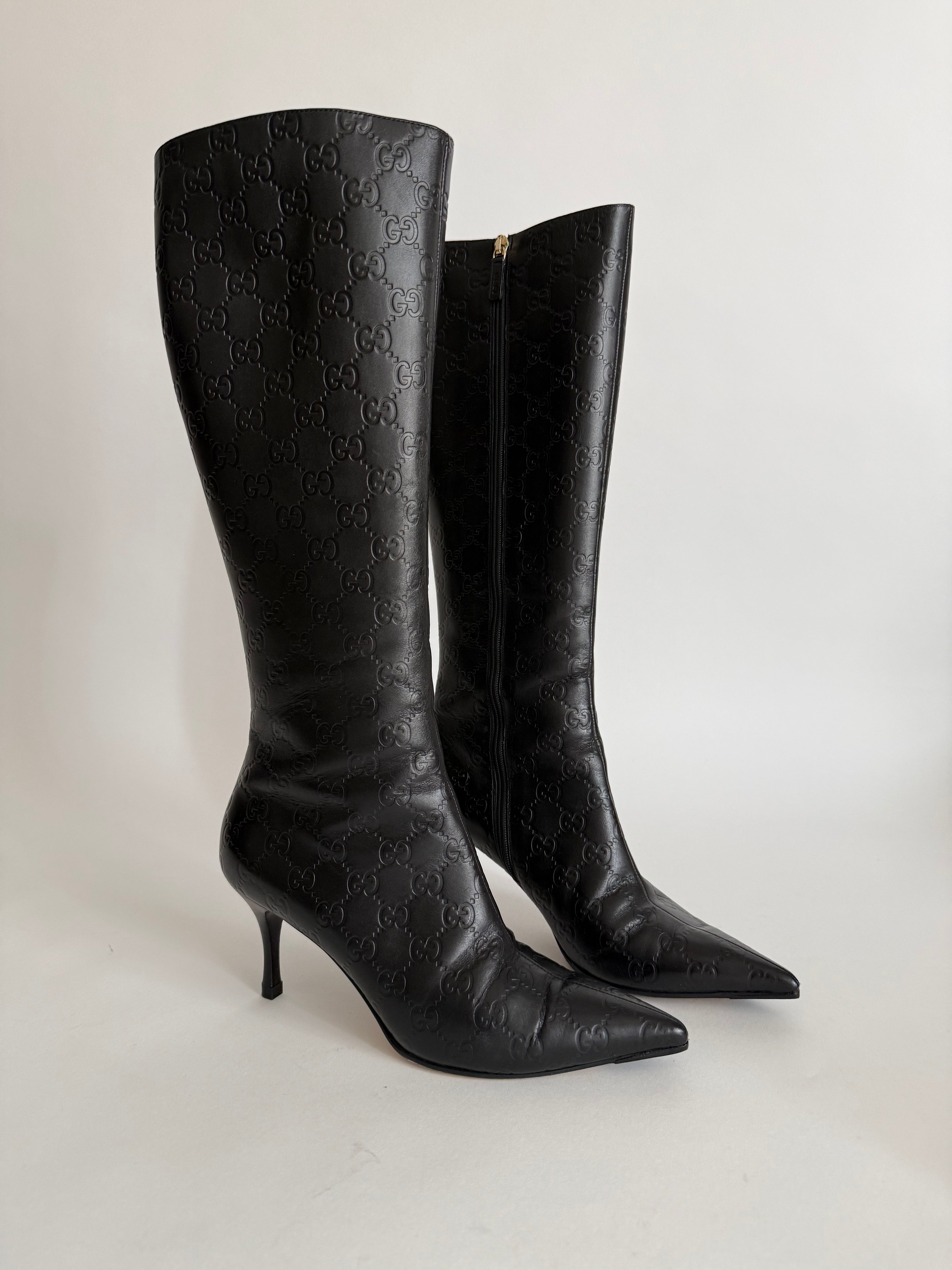Gucci monogram leather boots