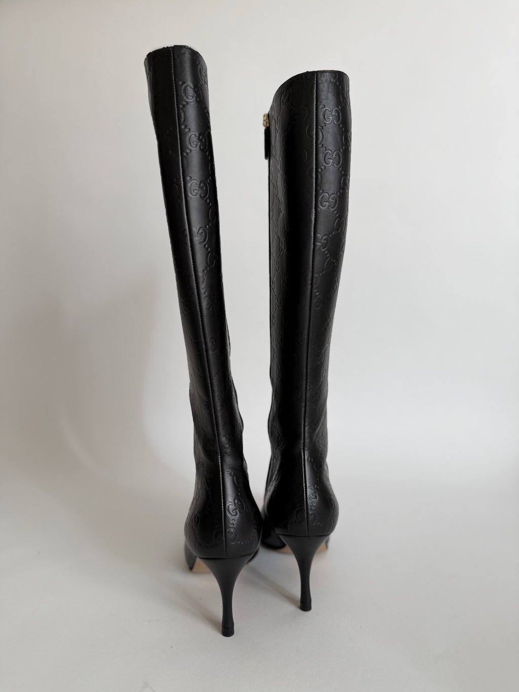 Gucci monogram leather boots