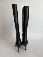 Gucci monogram leather boots