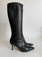 Gucci monogram leather boots