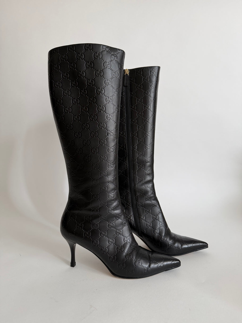 Gucci monogram leather boots