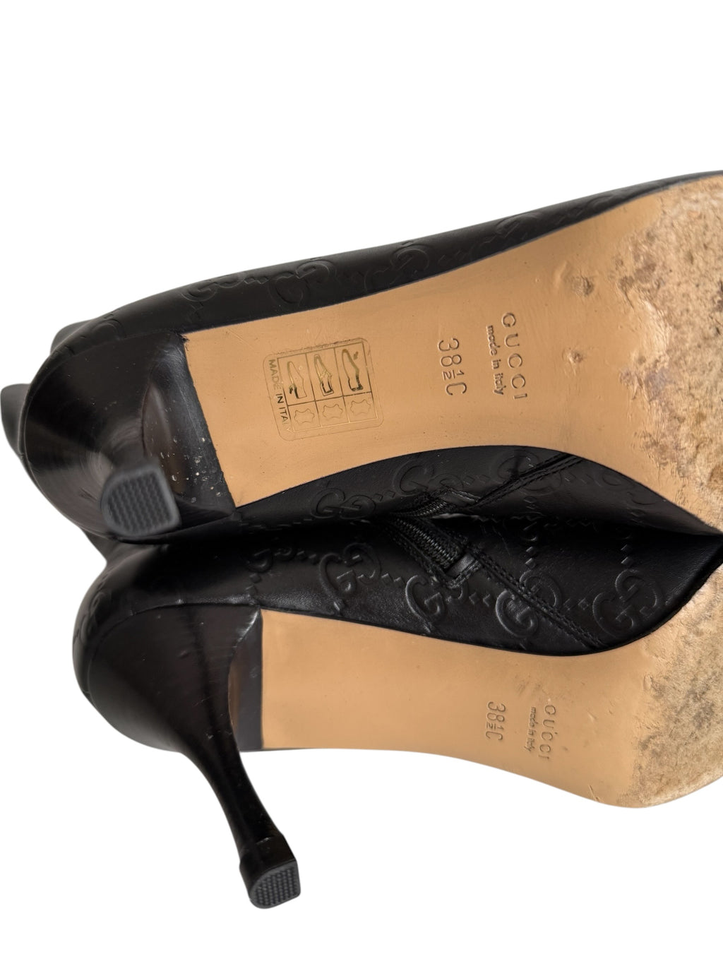 Gucci monogram leather boots