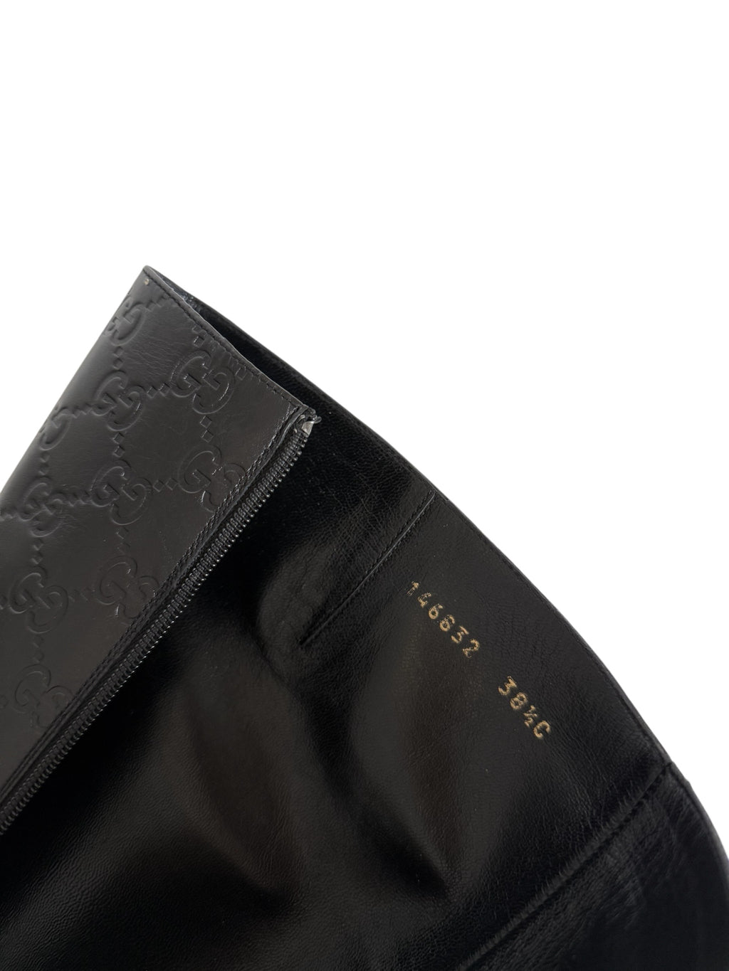 Gucci monogram leather boots