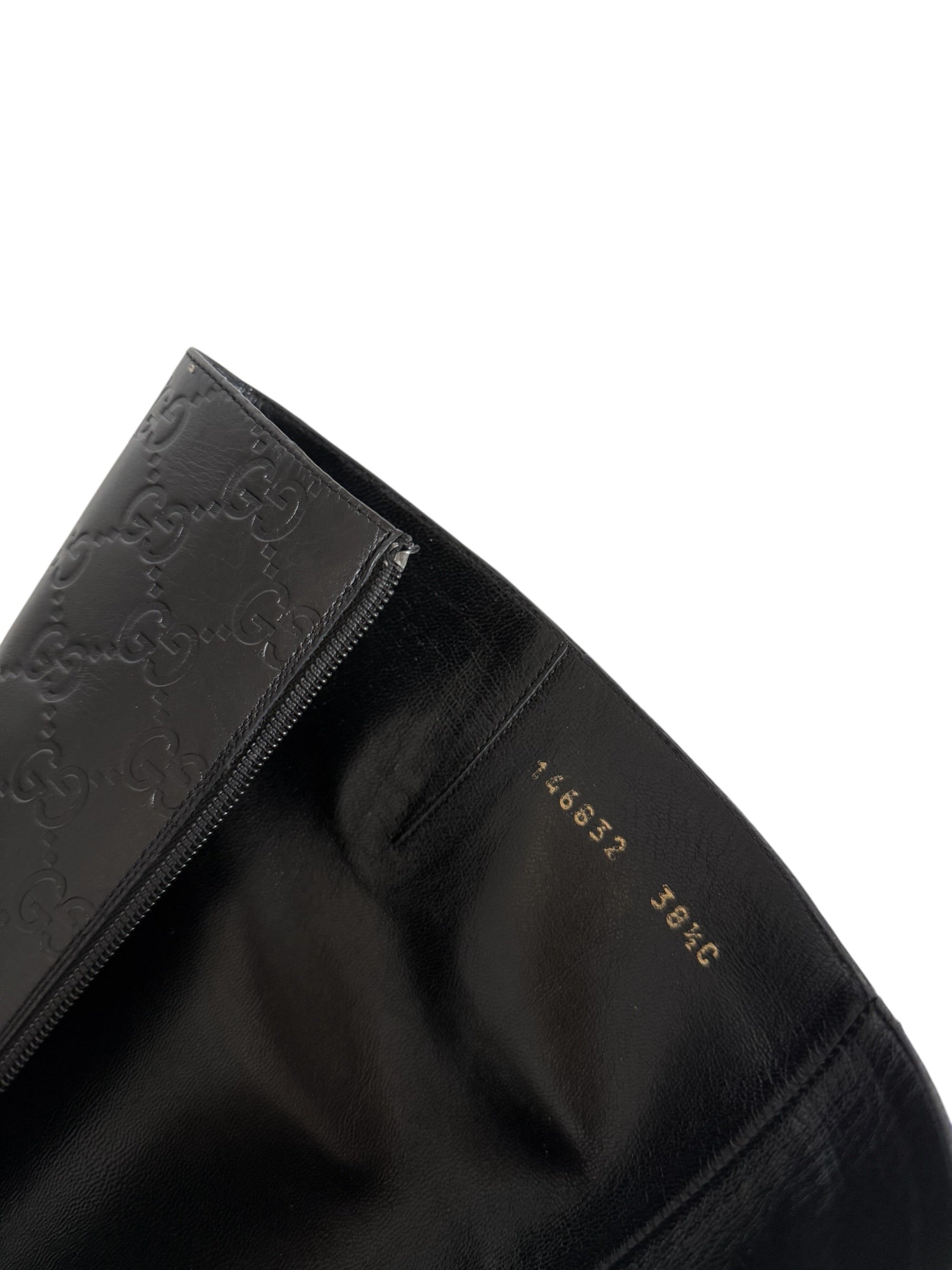 Gucci monogram leather boots