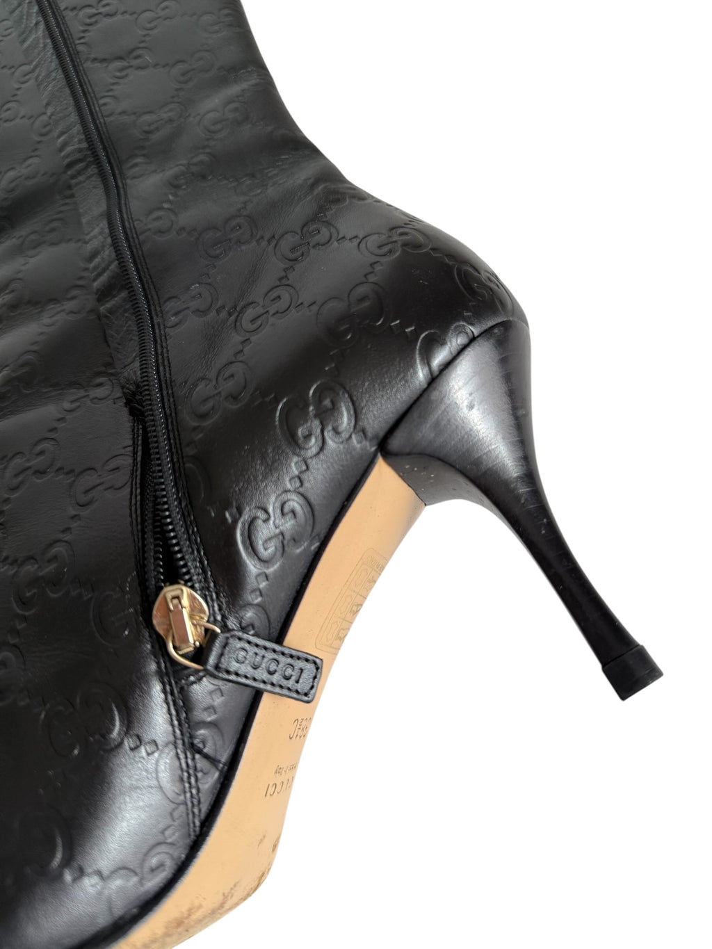 Gucci monogram leather boots