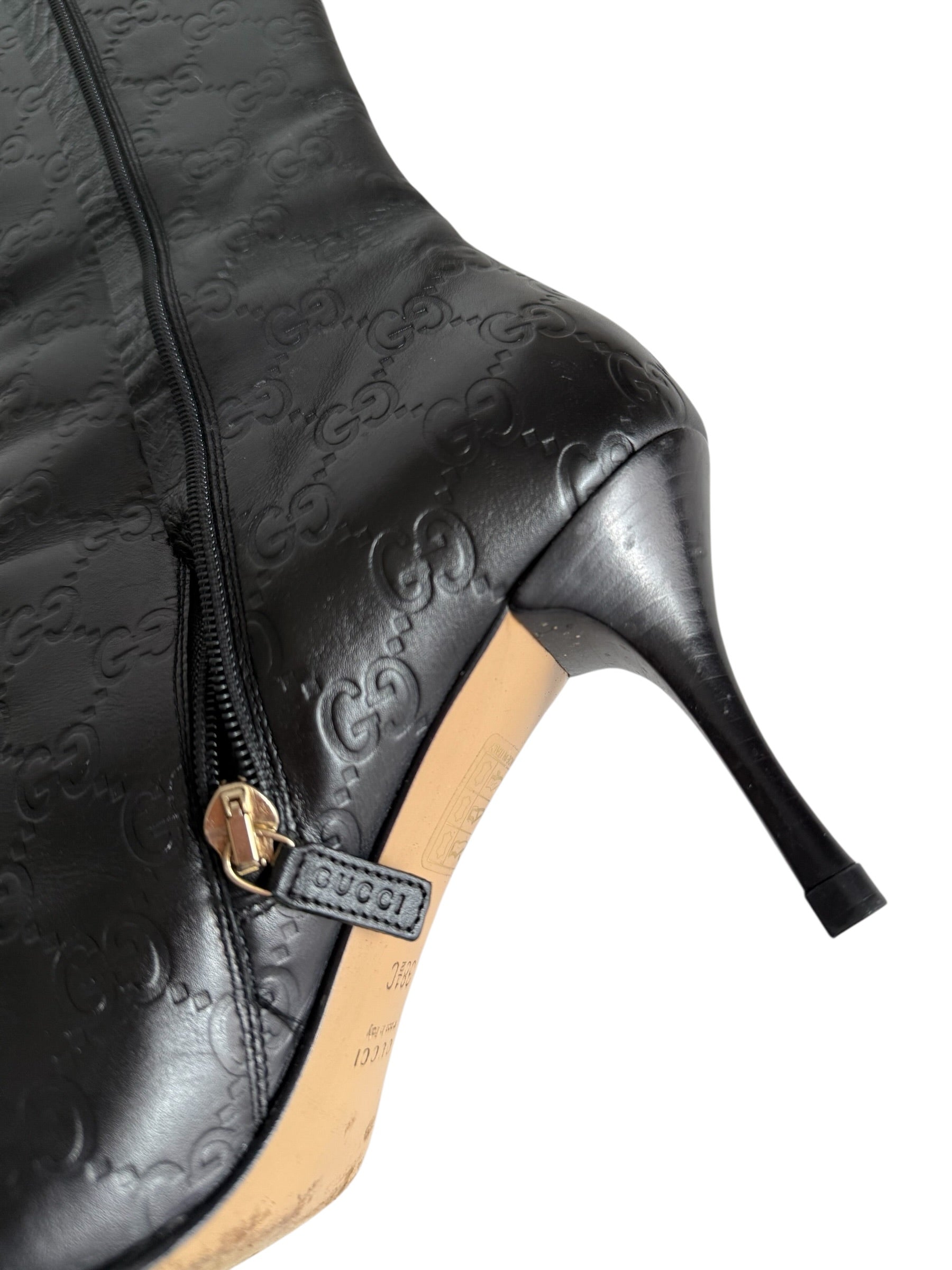 Gucci monogram leather boots