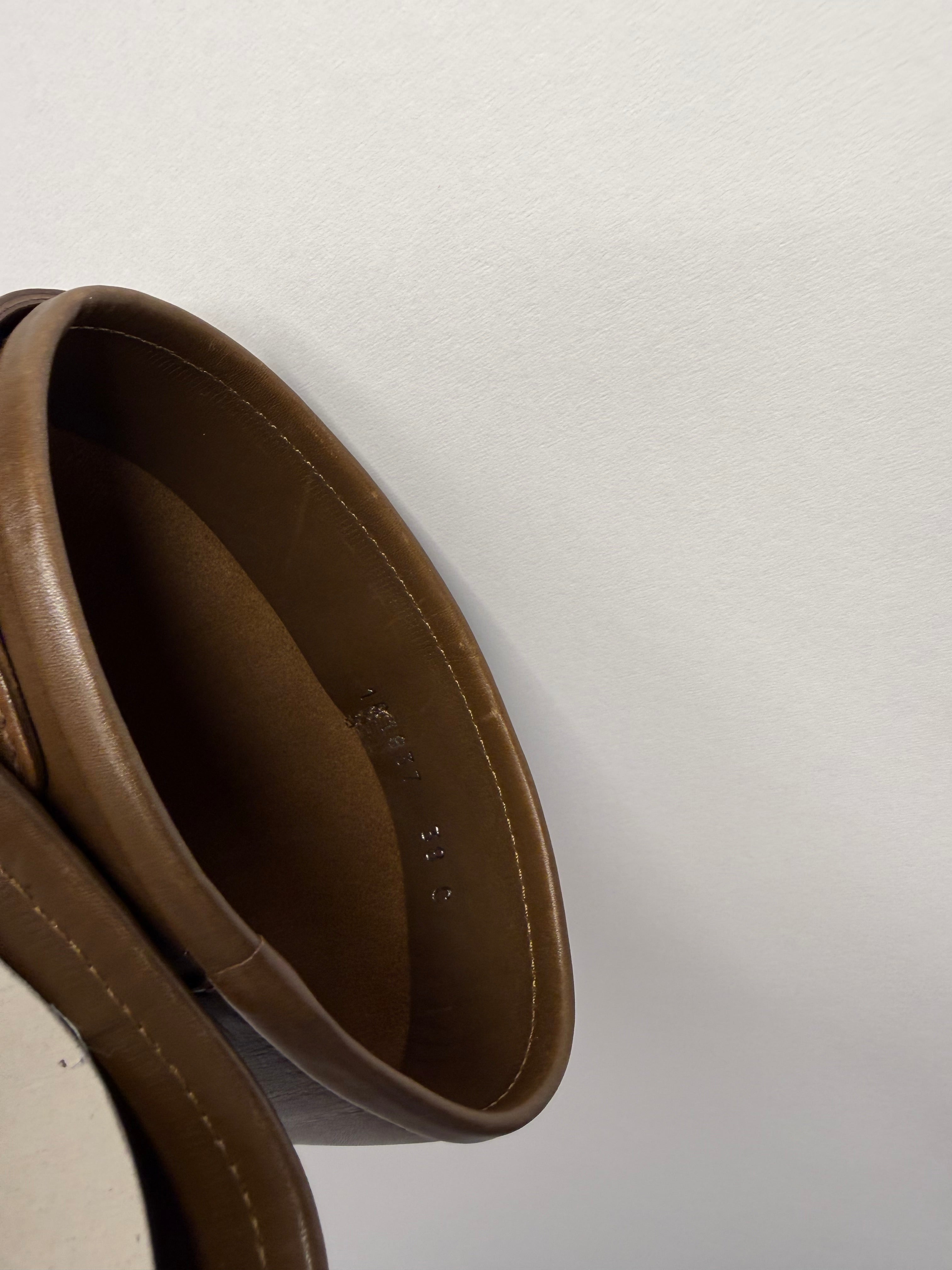 Gucci brown biker boots by Tom Ford