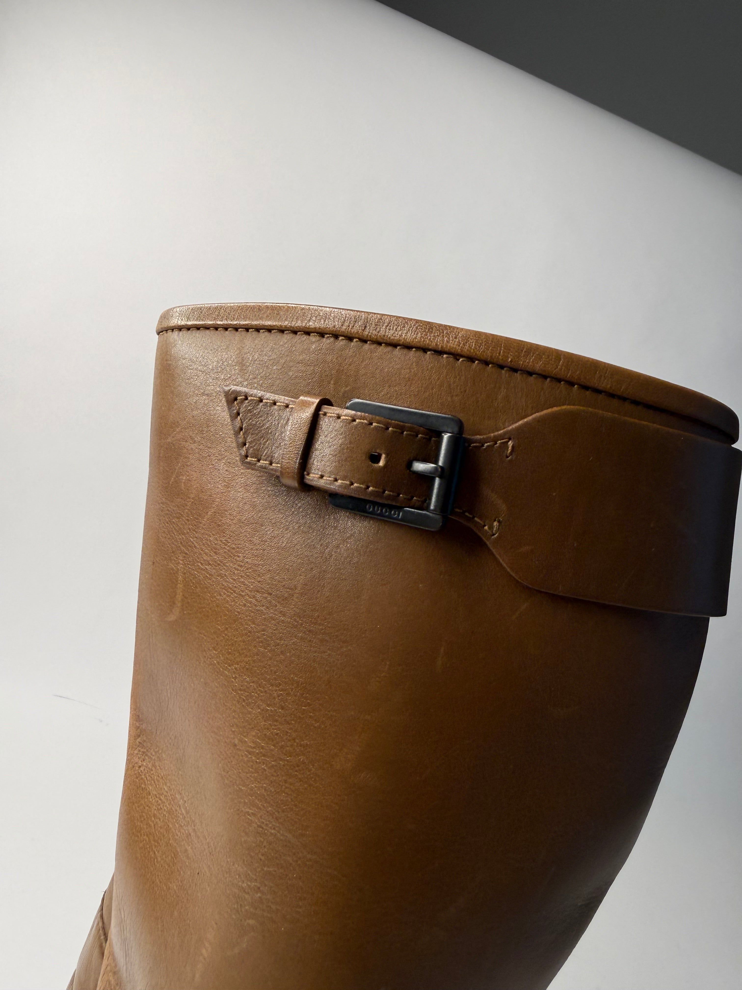 Gucci brown biker boots by Tom Ford