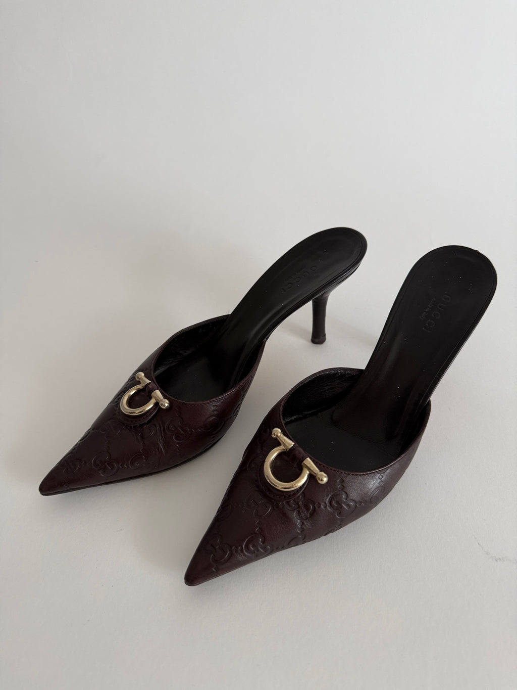 Gucci monogram leather GG mules