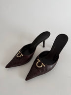 Gucci monogram leather GG mules