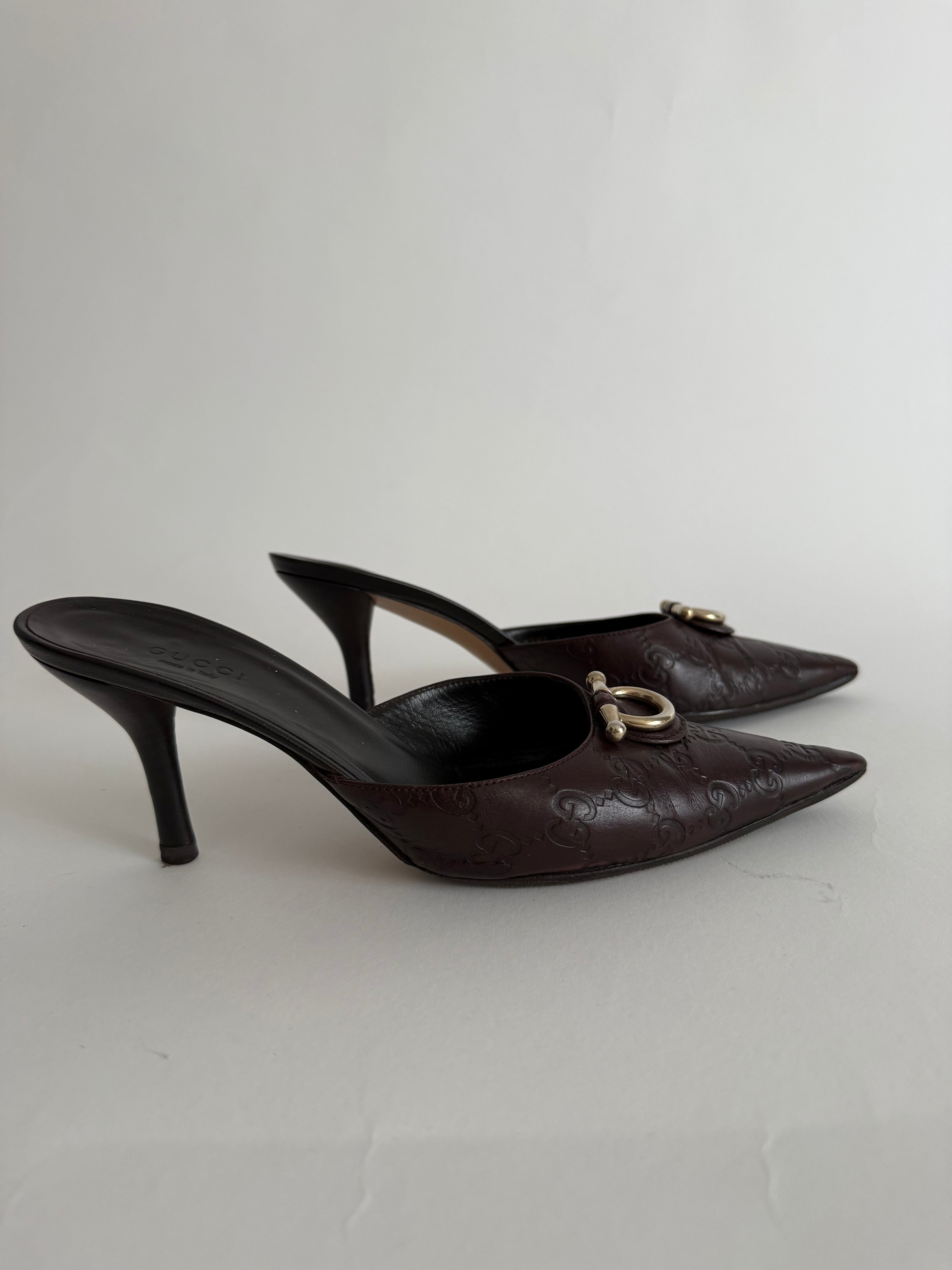 Gucci monogram leather GG mules