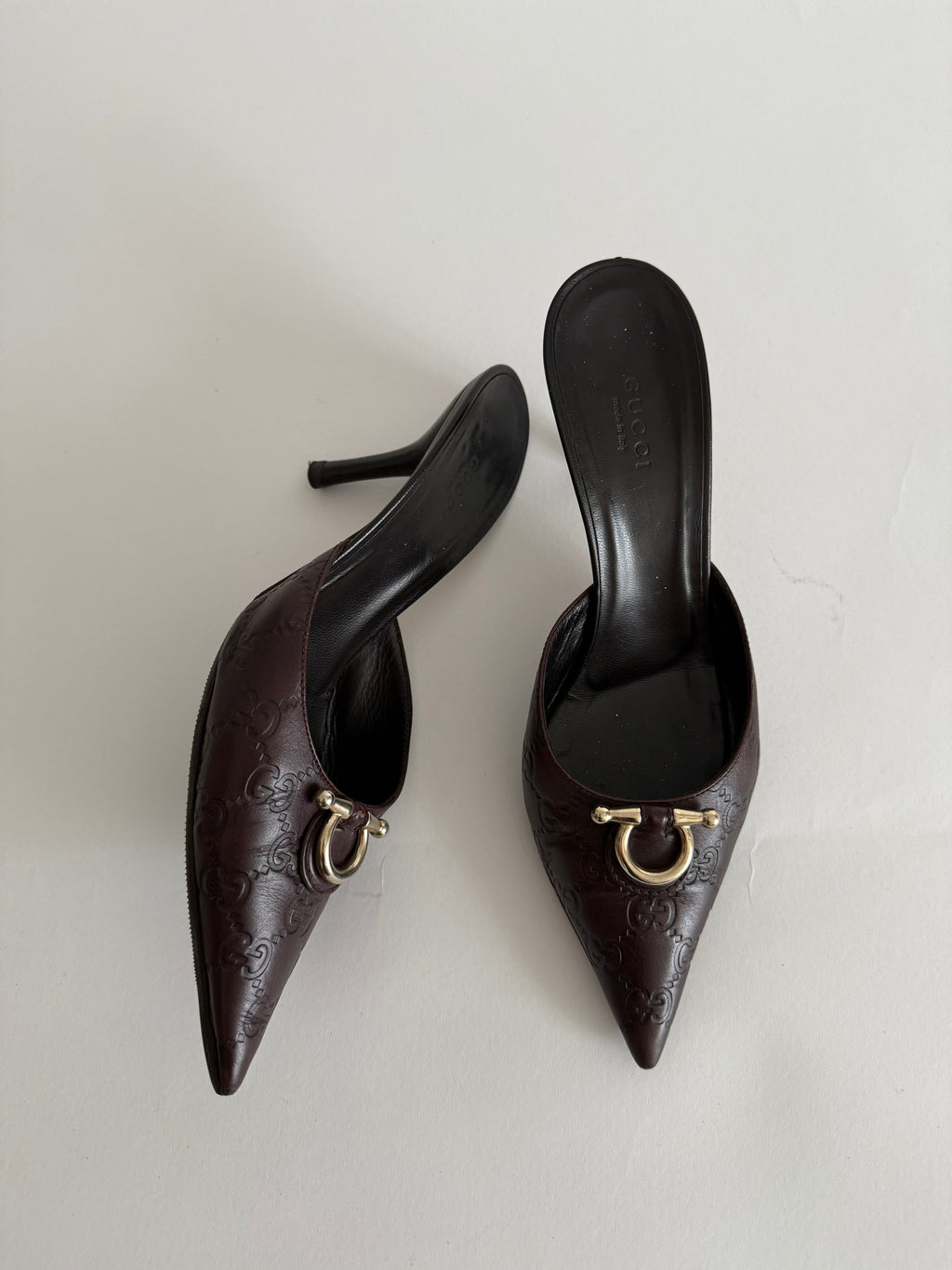 Gucci monogram leather GG mules