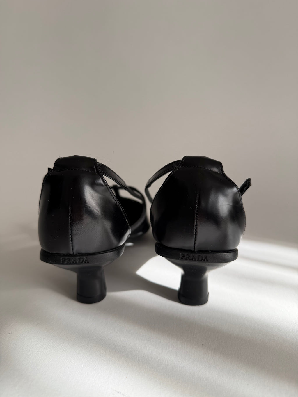 Prada black leather pumps t-strap 90s