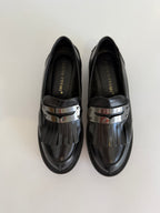 Black fringe moccasin