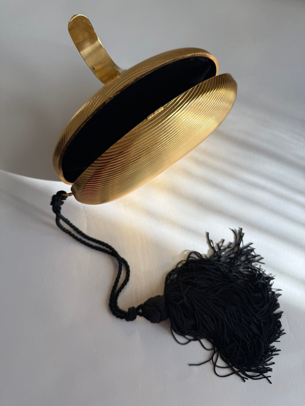 Gold egg shape metal clutch vintage with tassel