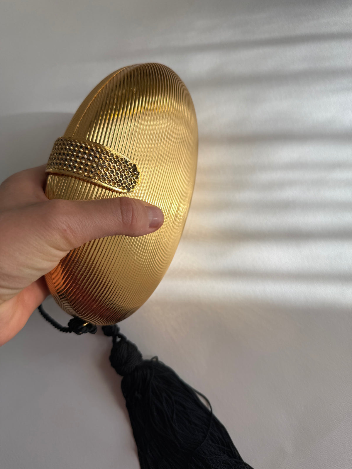 Gold egg shape metal clutch vintage with tassel