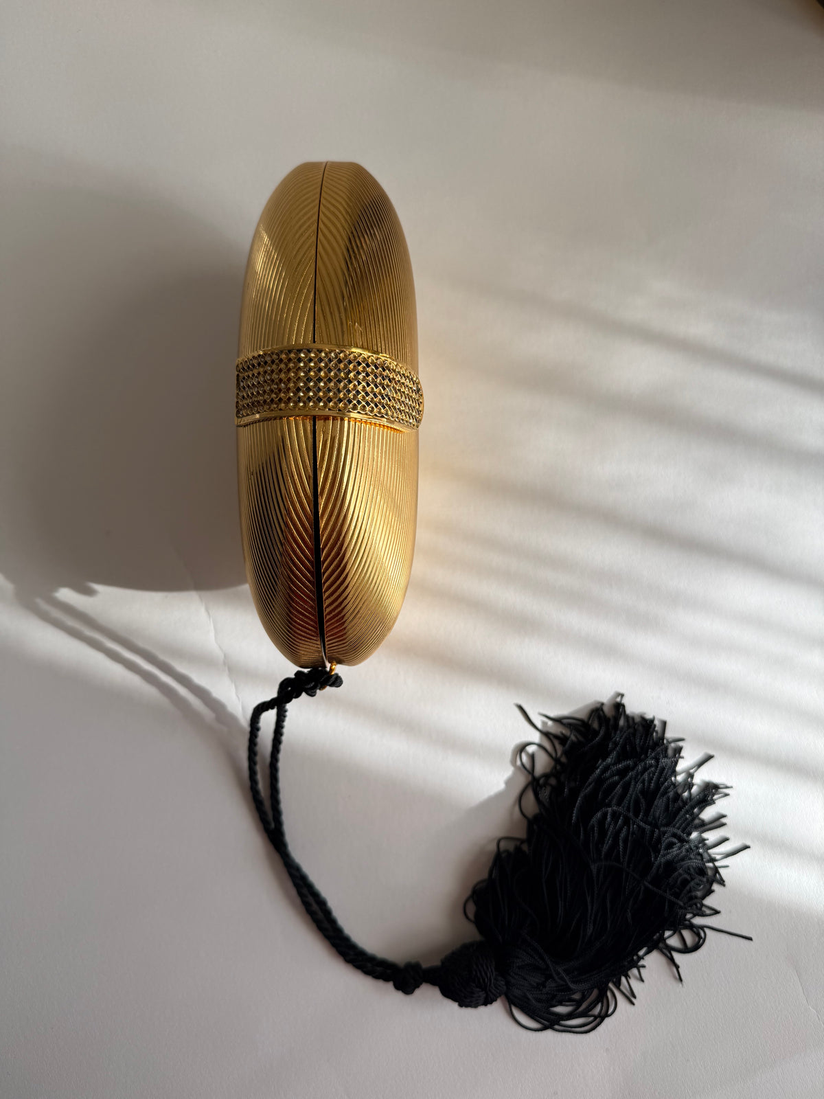 Gold egg shape metal clutch vintage with tassel