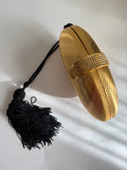 Gold egg shape metal clutch vintage with tassel