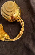 Gold egg metal clutch with tassel "Melone" from 70s