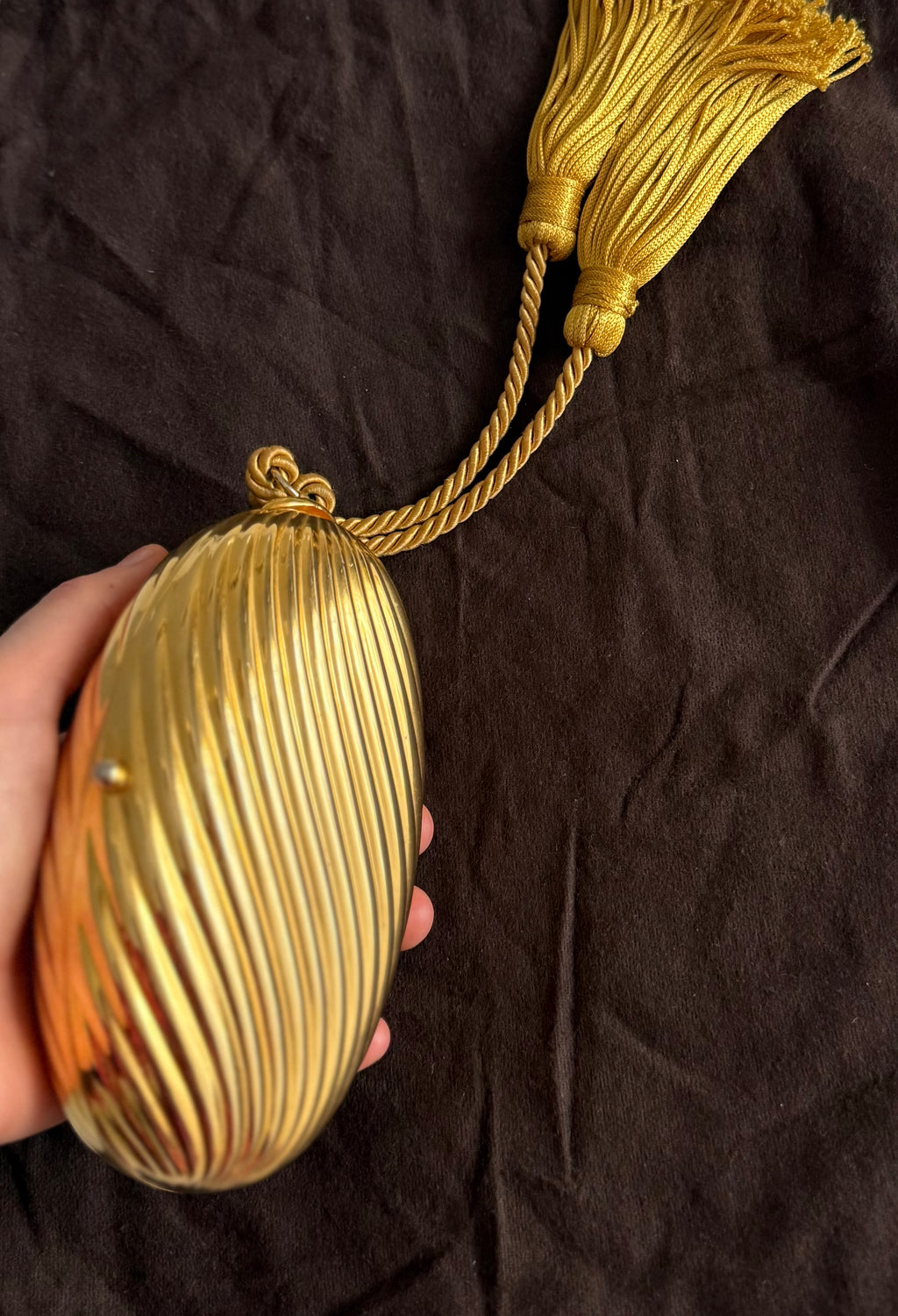 Gold egg metal clutch with tassel "Melone" from 70s