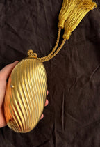 Gold egg metal clutch with tassel "Melone" from 70s