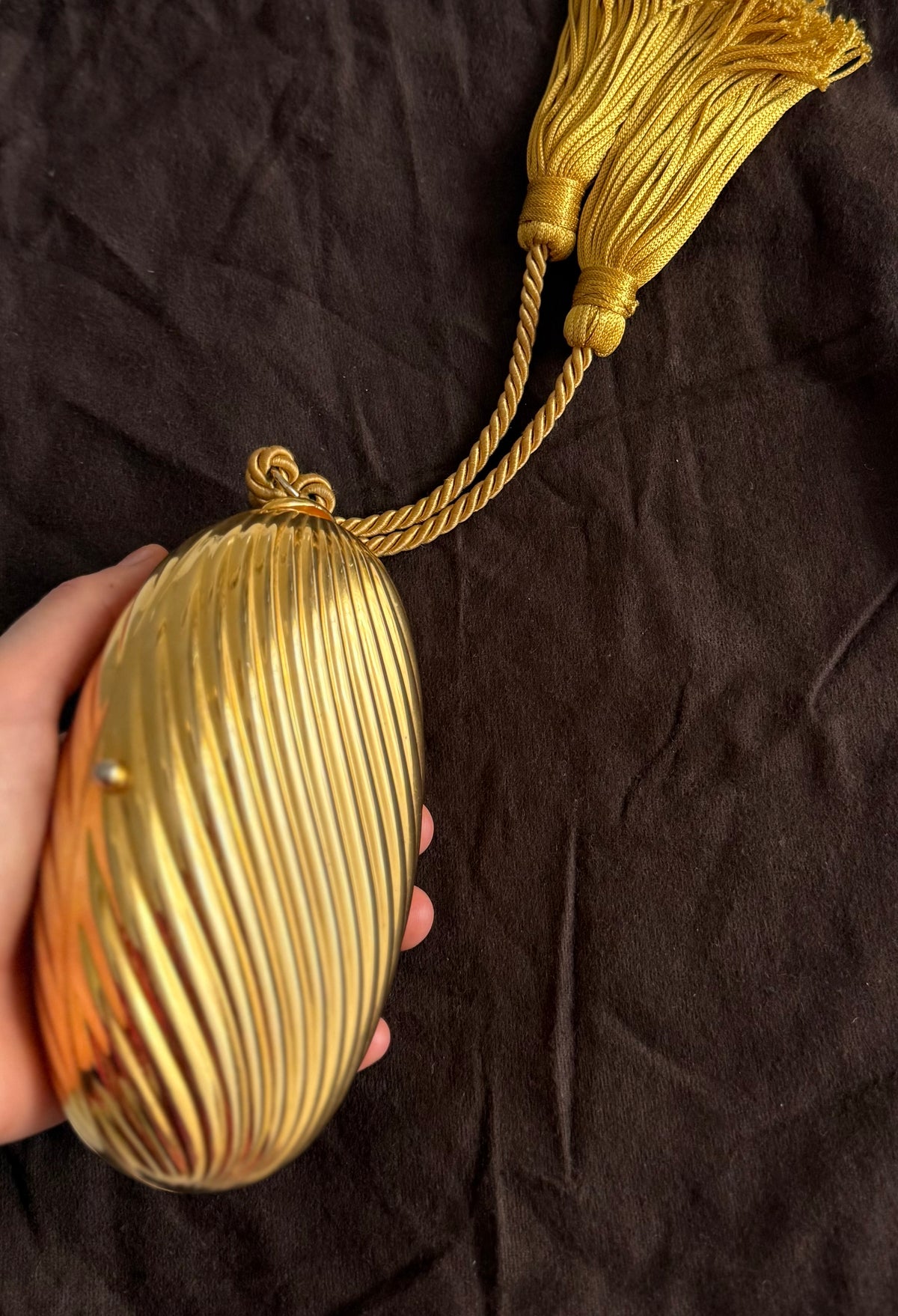 Gold egg metal clutch with tassel "Melone" from 70s