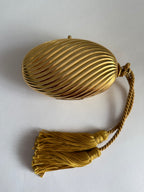 Gold egg metal clutch with tassel "Melone" from 70s