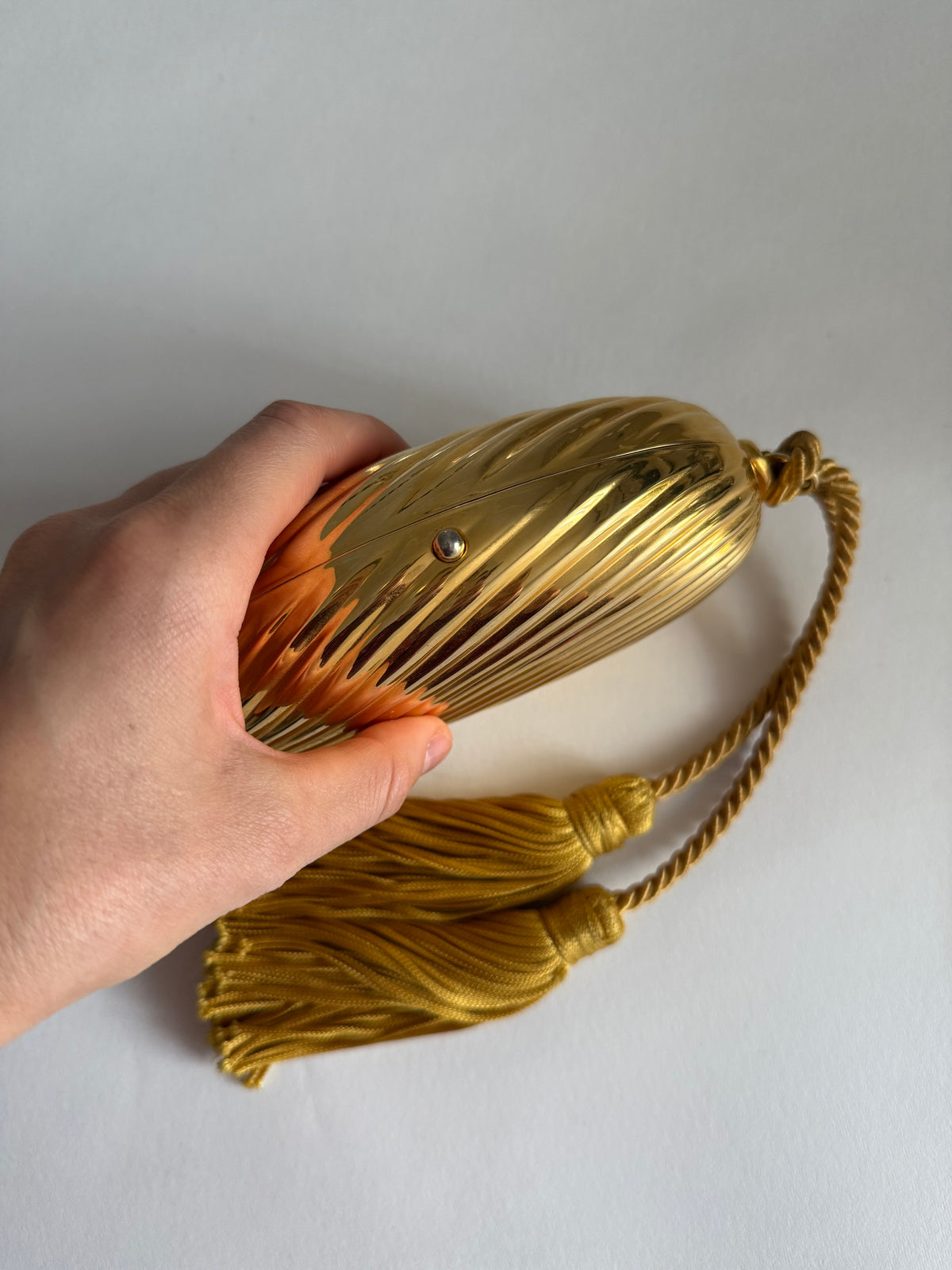 Gold egg metal clutch with tassel "Melone" from 70s