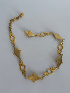 Gianni Versace gold mask belt medusa SS 1992 circa