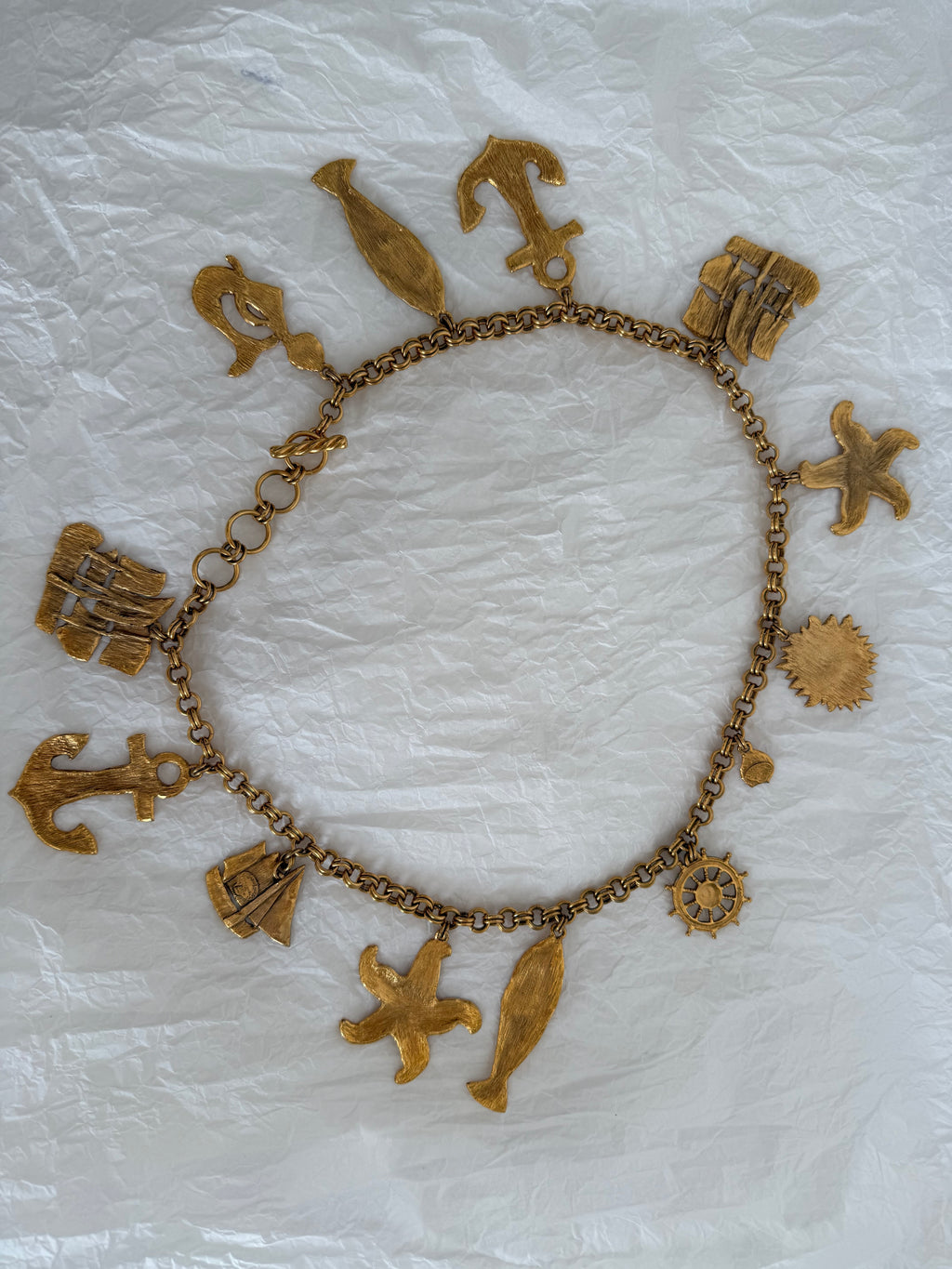 Yves Saint Laurent gold metal belt pendant sea 80s