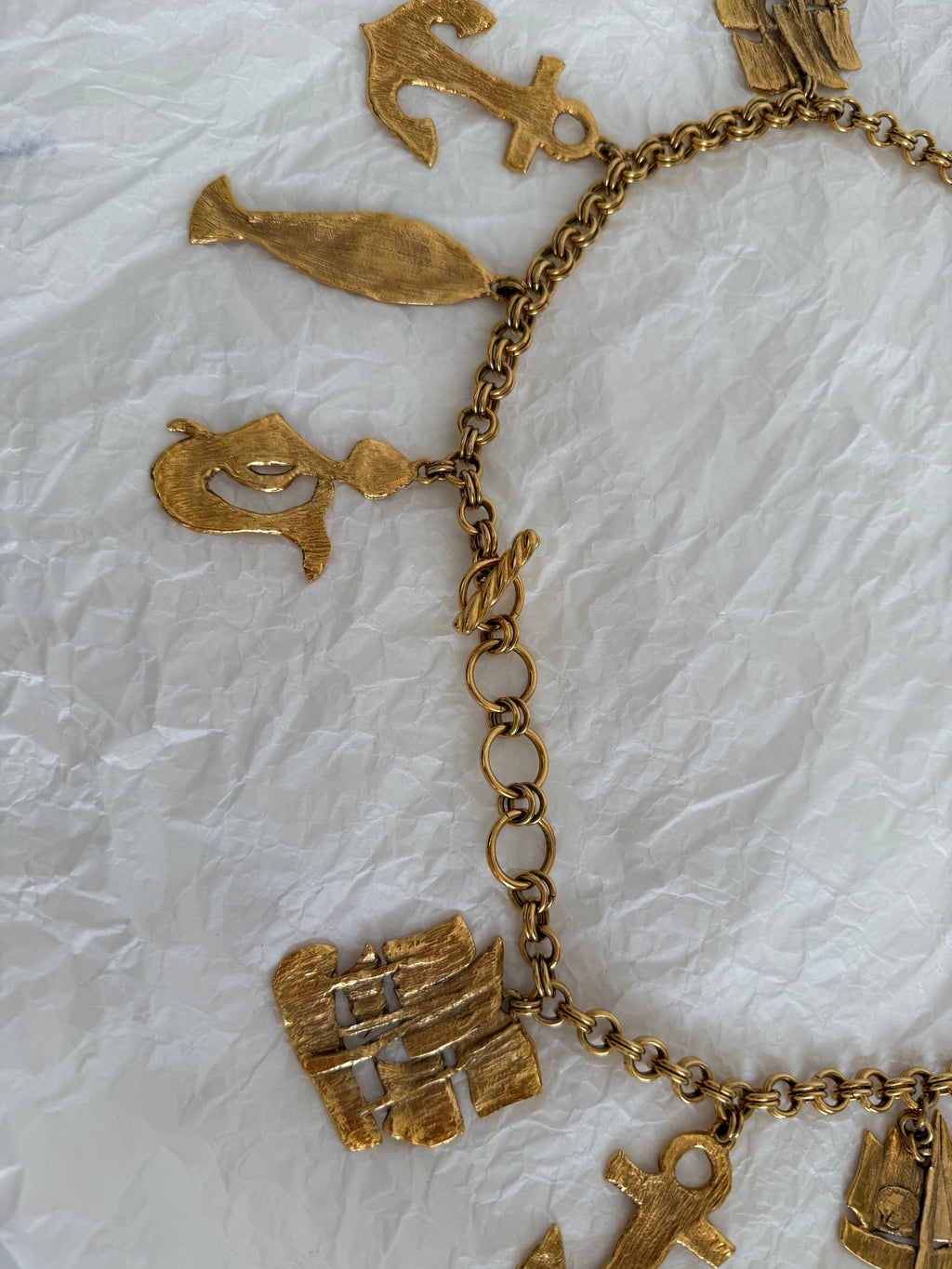 Yves Saint Laurent gold metal belt pendant sea 80s