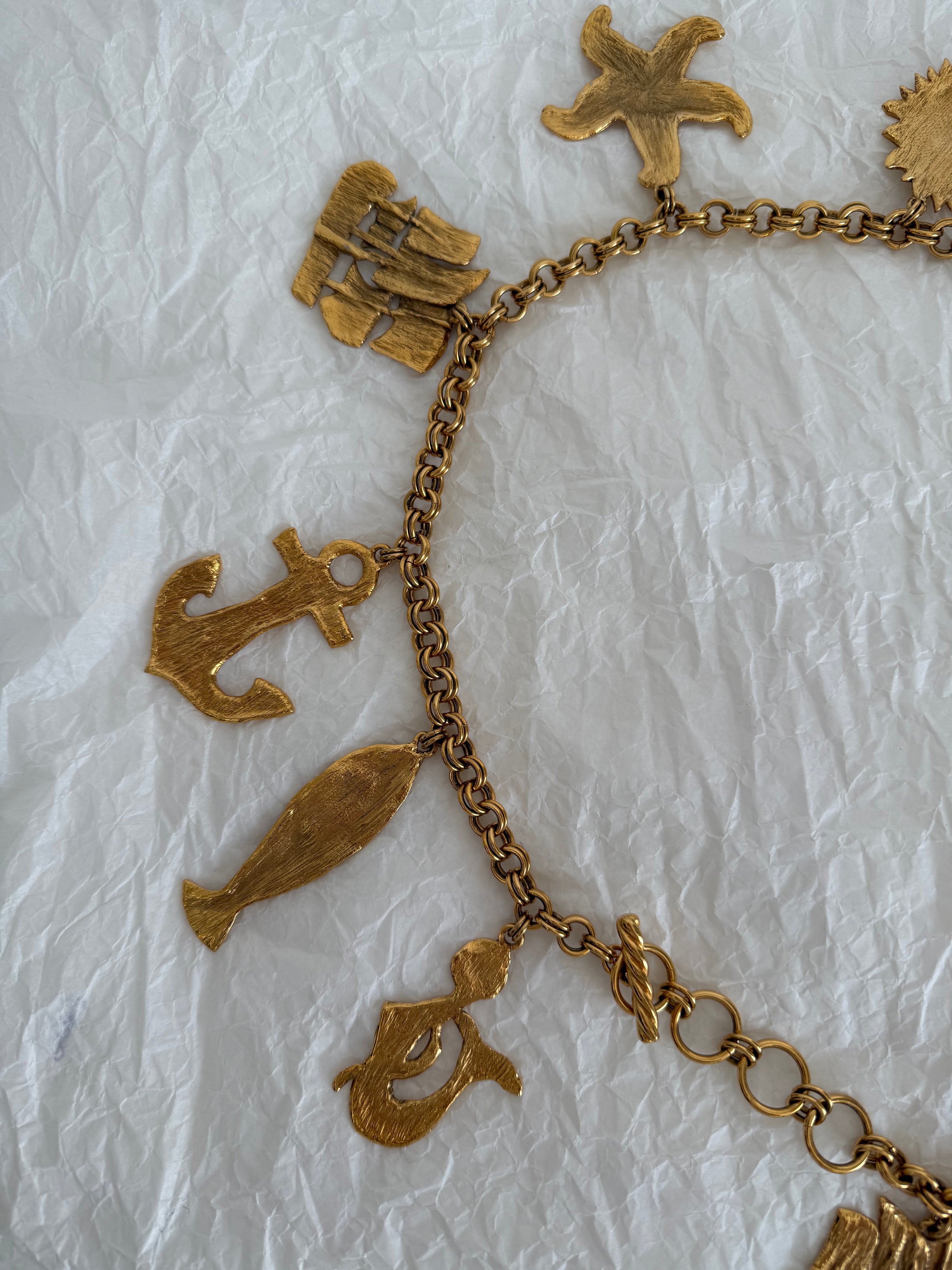 Yves Saint Laurent gold metal belt pendant sea 80s