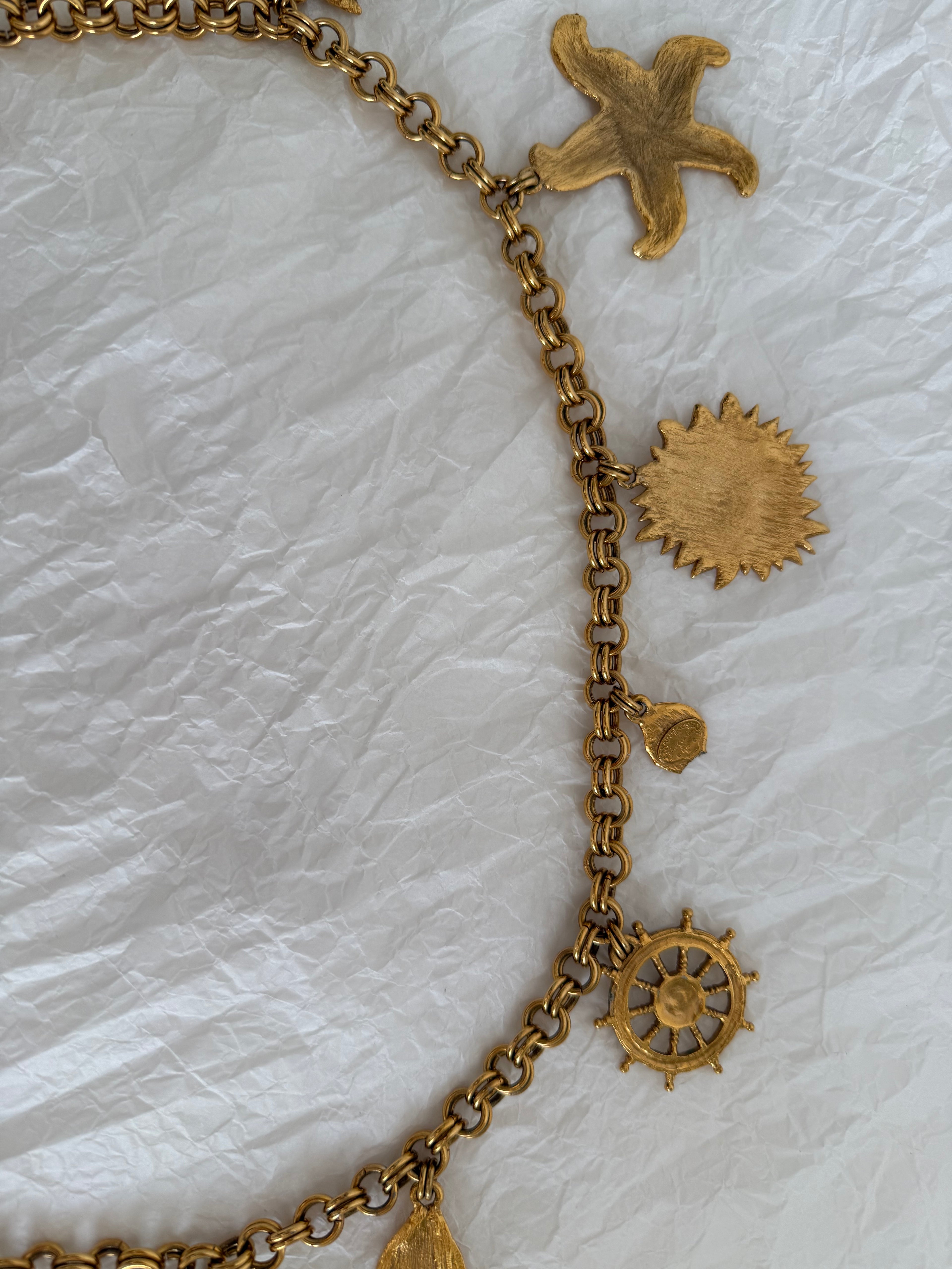 Yves Saint Laurent gold metal belt pendant sea 80s