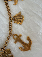 Yves Saint Laurent gold metal belt pendant sea 80s