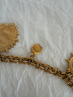Yves Saint Laurent gold metal belt pendant sea 80s