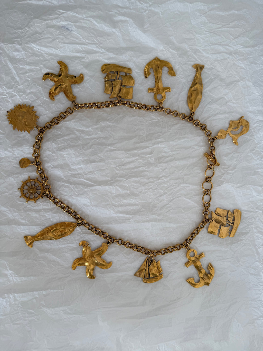 Yves Saint Laurent gold metal belt pendant sea 80s