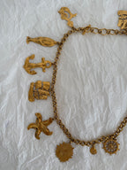 Yves Saint Laurent gold metal belt pendant sea 80s