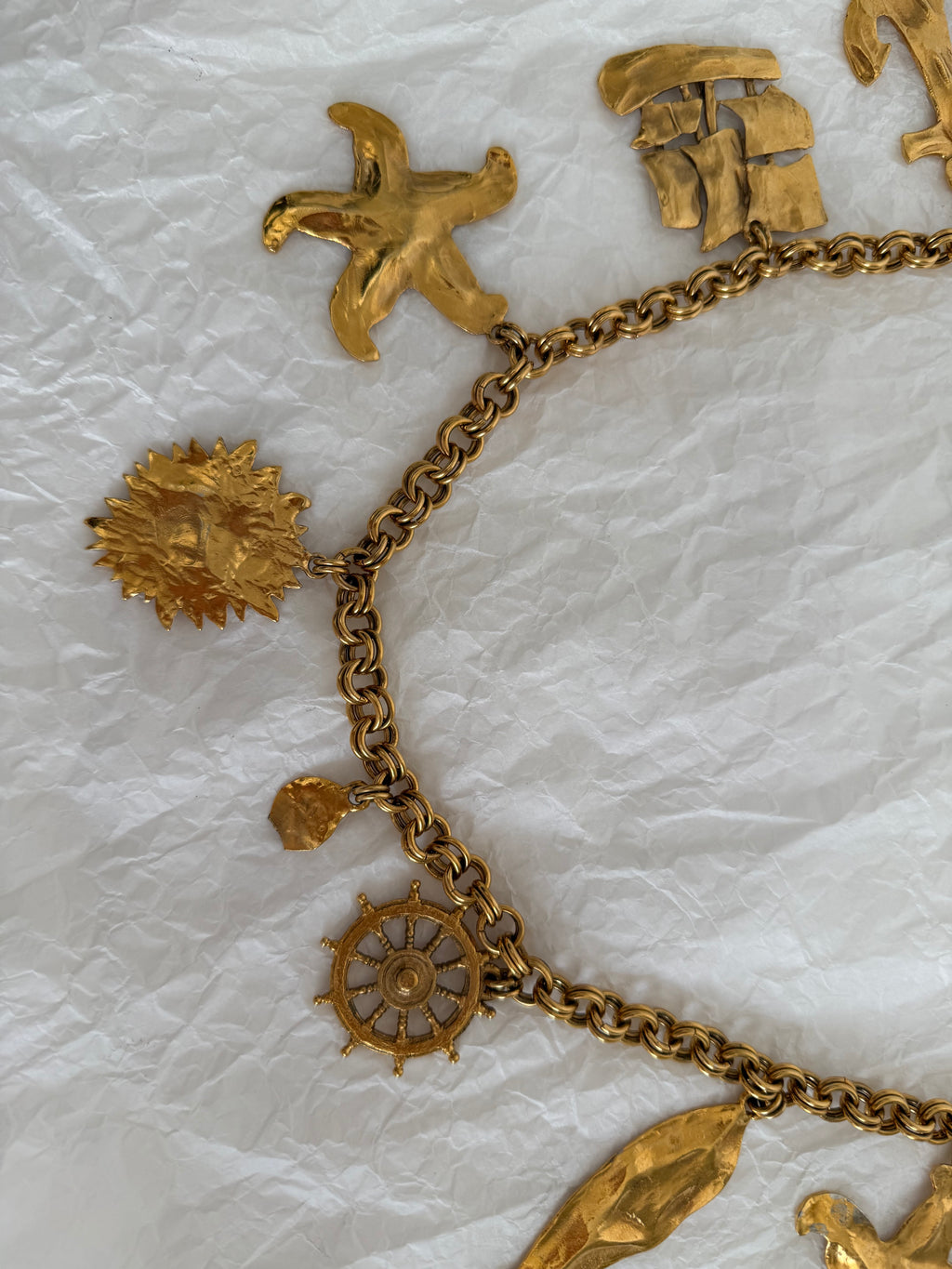 Yves Saint Laurent gold metal belt pendant sea 80s
