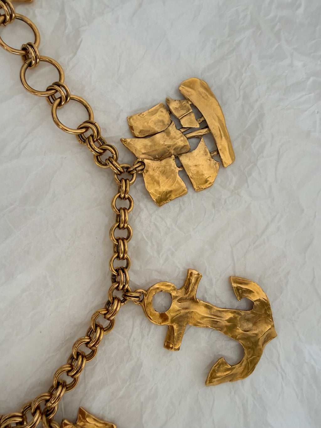Yves Saint Laurent gold metal belt pendant sea 80s