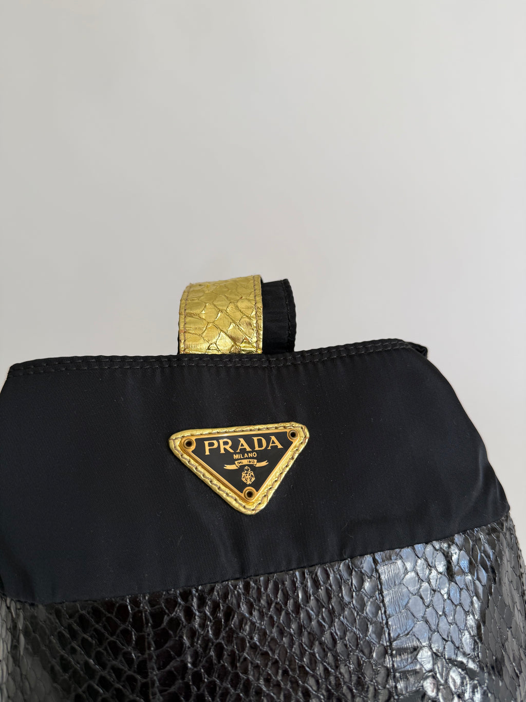 Prada gold black python bag