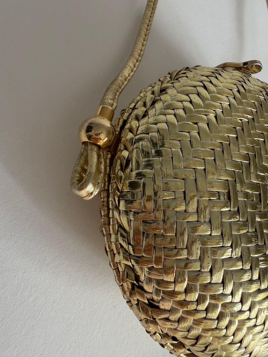 Rodo gold clutch wicker bag