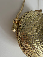 Rodo gold clutch wicker bag