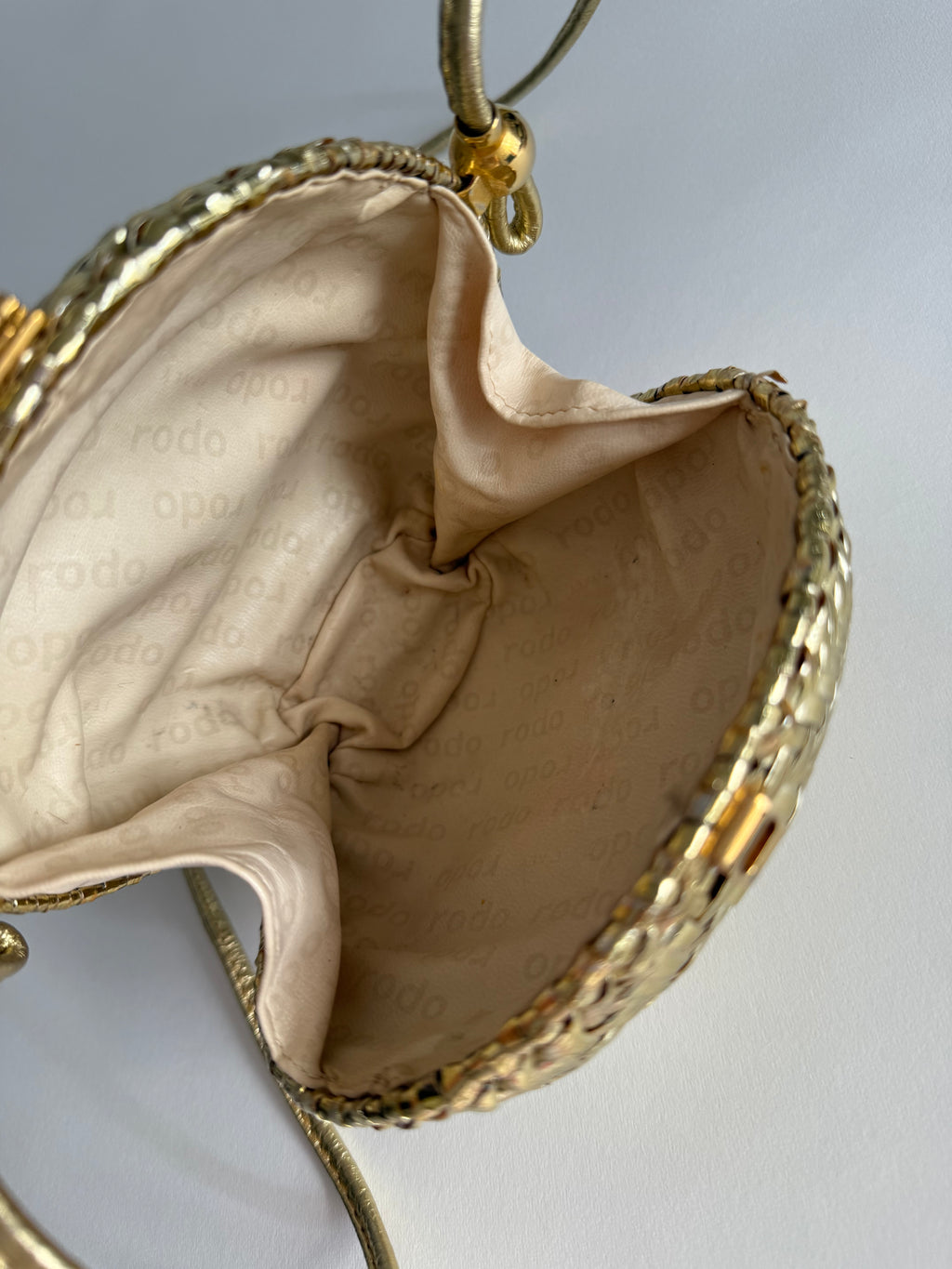 Rodo gold clutch wicker bag