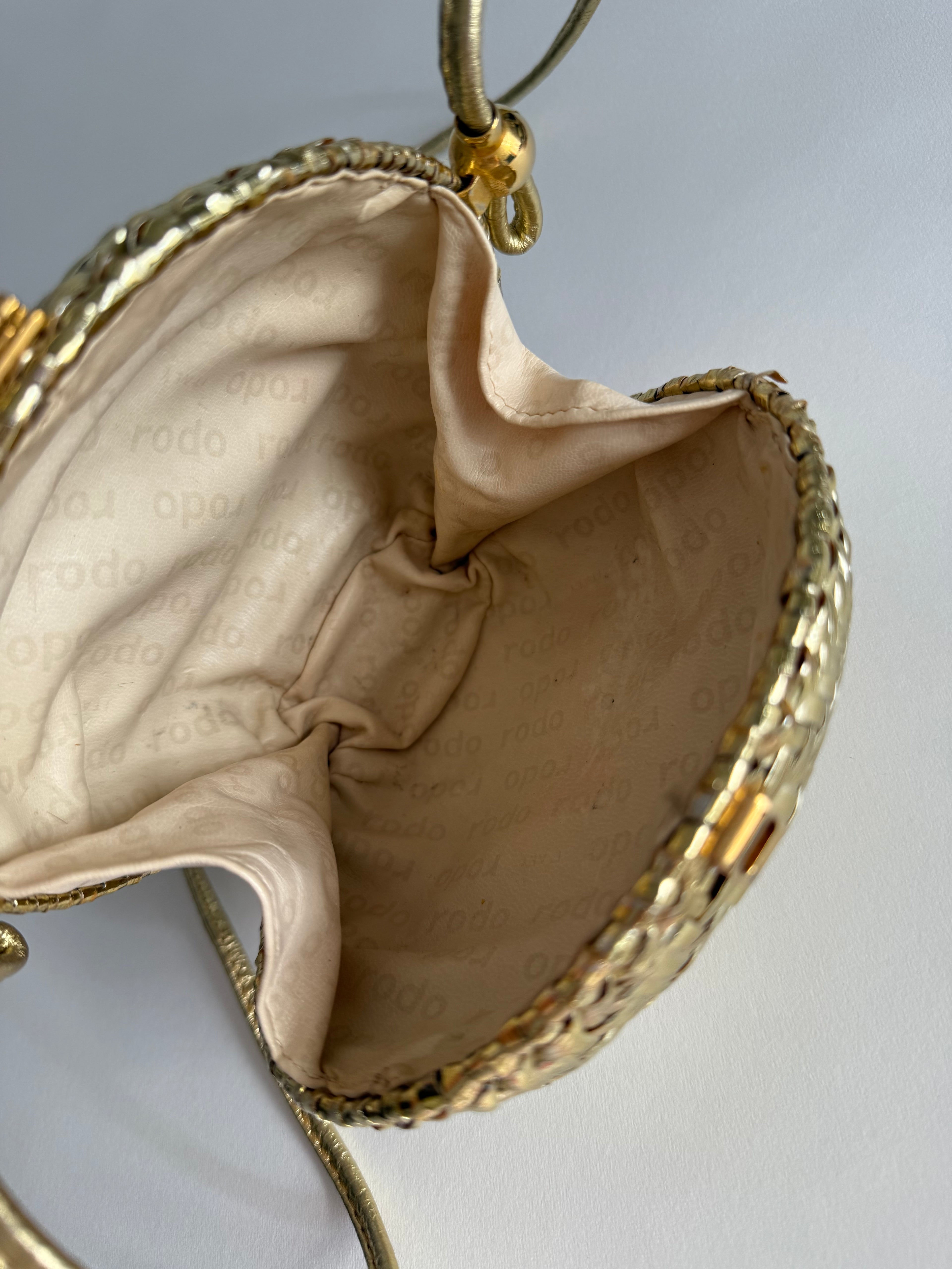 Rodo gold clutch wicker bag