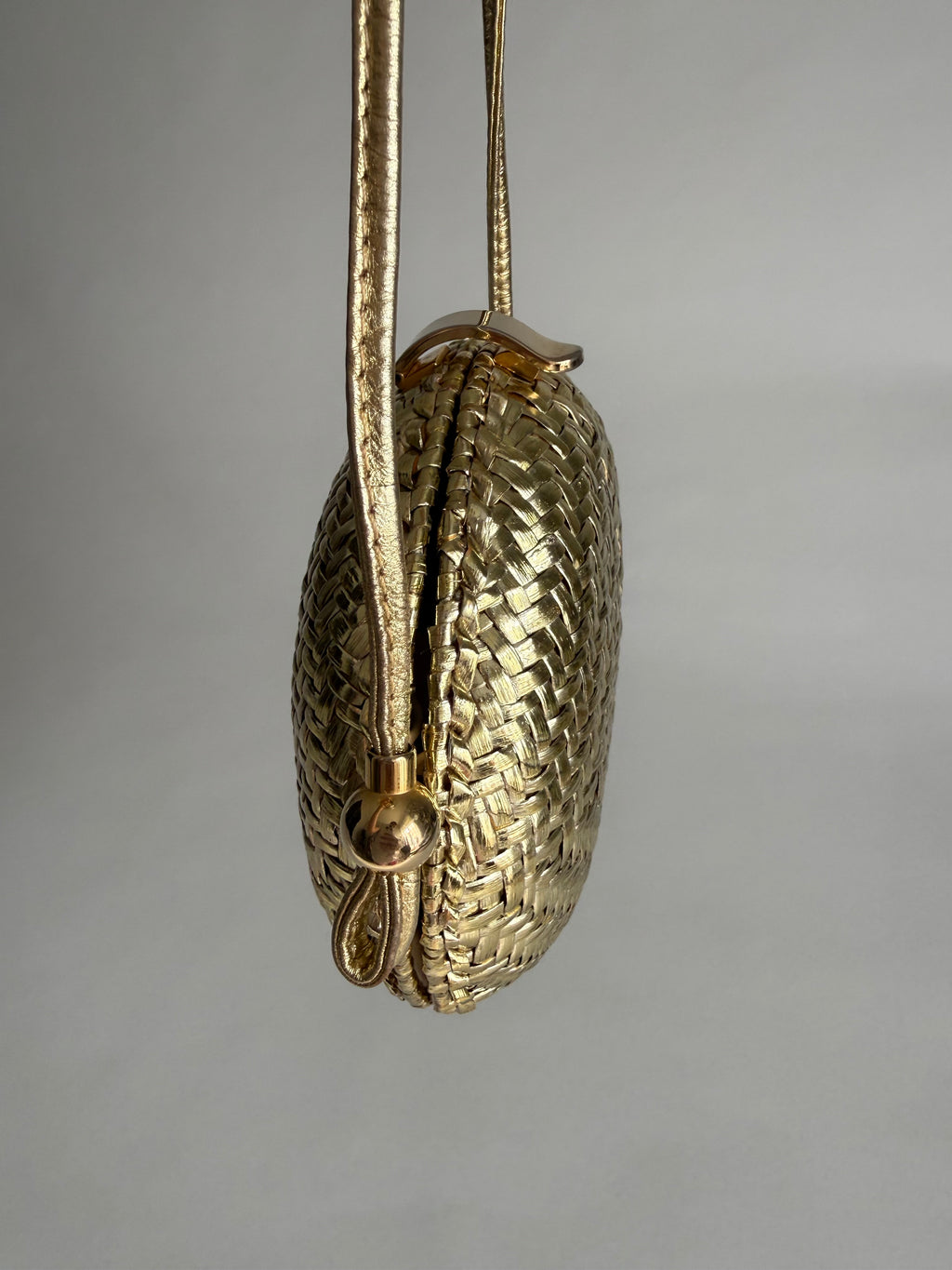 Rodo gold clutch wicker bag
