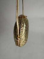 Rodo gold clutch wicker bag