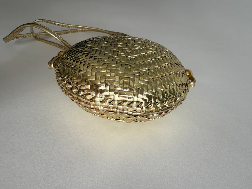Rodo gold clutch wicker bag